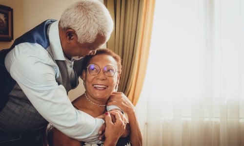 Seniors Enjoying being served in dining room